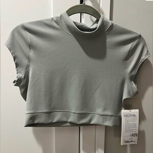 Lululemon- Light sage green- mock neck- super crop- short sleeve